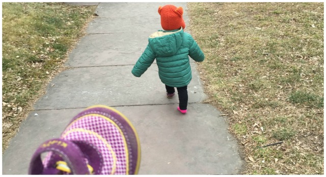 Toddler gives up on putting her shoe on