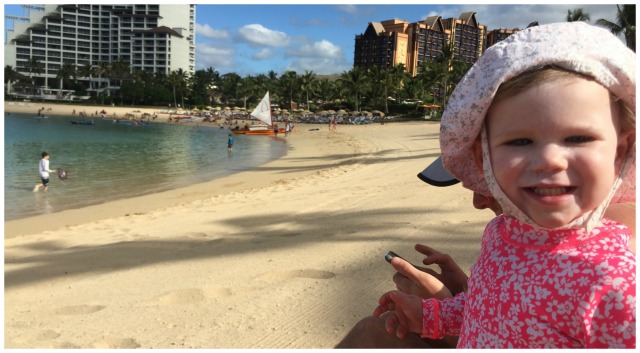 We're not perfect - Reagan's having a great time at the beach but notice Dad in the background!