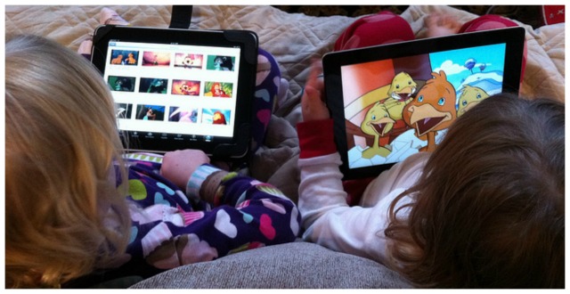 girls watching tv on ipad