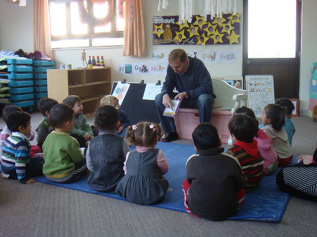 reading aloud to class - man