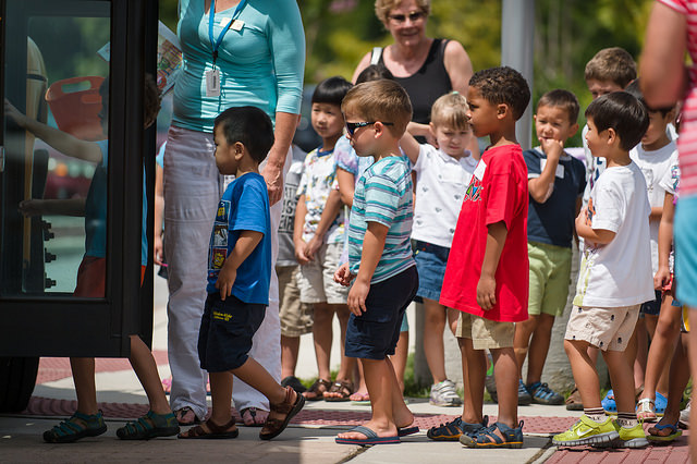 K kids getting on bus