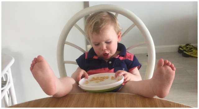 Reagan eating with feet up